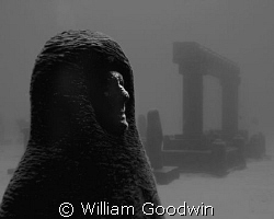 The entry arch and a sentry statue - face molded from one... by William Goodwin 